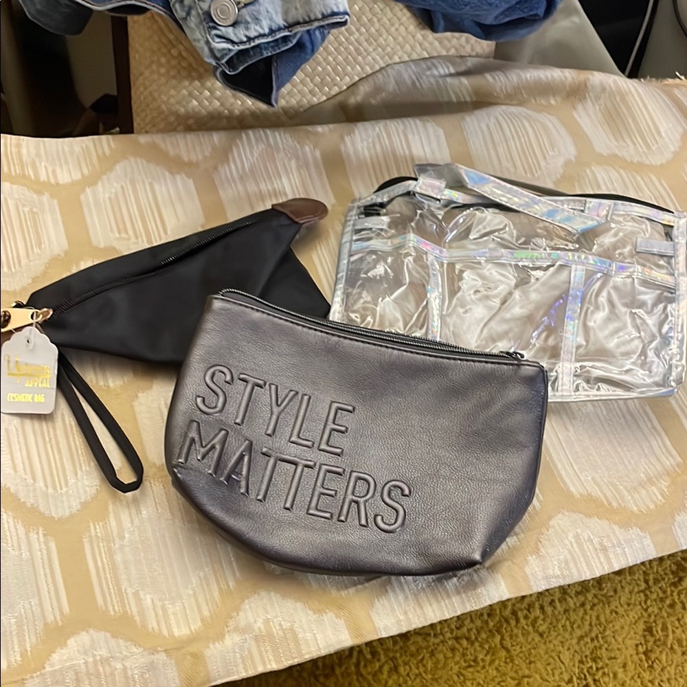 3 cosmetic bags. 1 Style Matters, 1 Uptown Appeal and 1 non branded.